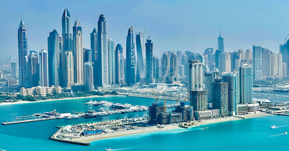 Layover: Dubai or Doha - High Rise Buildings Near Body of Water