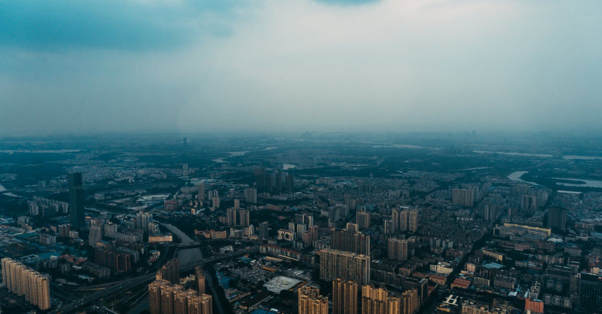 Layover in Shenzhen and Guangzhou - Aerial Photography of Brown City Buildings