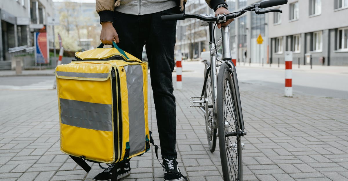 Layover in Warsaw. Will I be quarantined? - Man Carrying a Yellow Bag