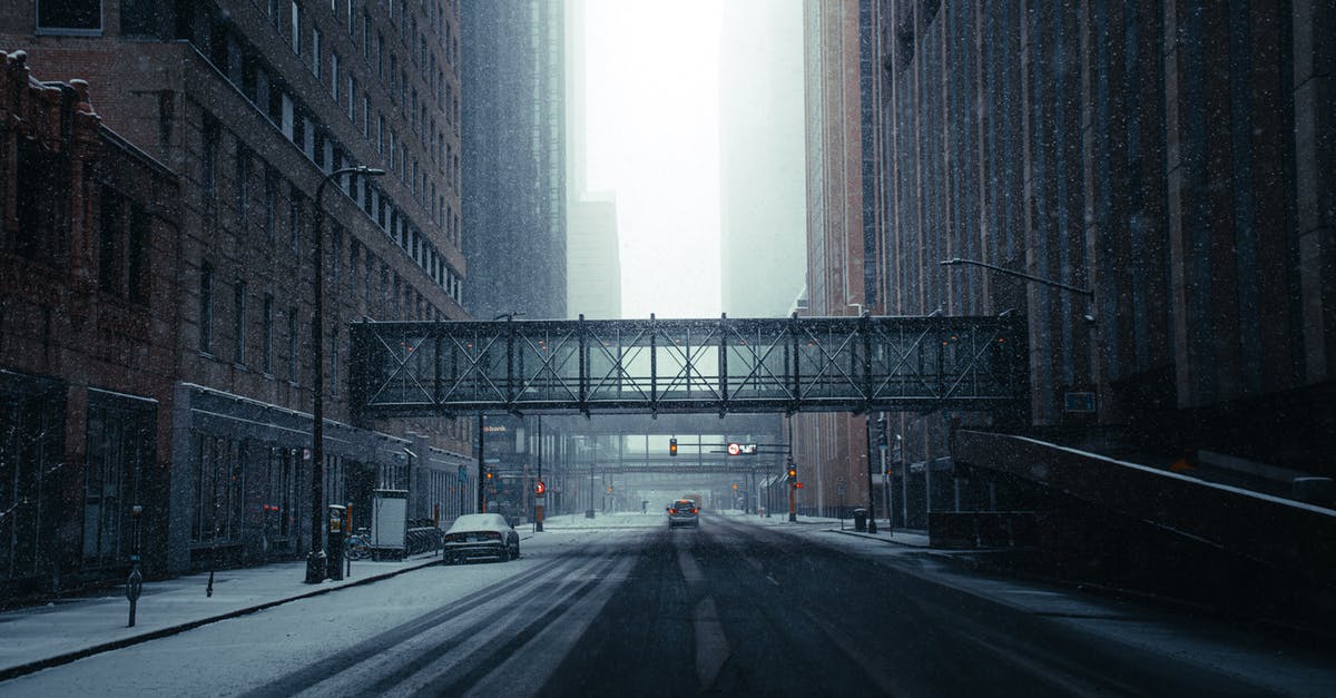 Layover Minneapolis - Empty Road Between High Rise Buildings