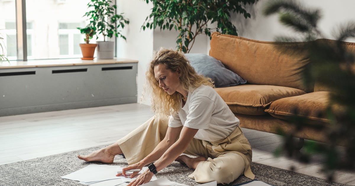 Layovers in Italy and Ireland, are documents required? - Woman in White Shirt Sitting on Brown Couch