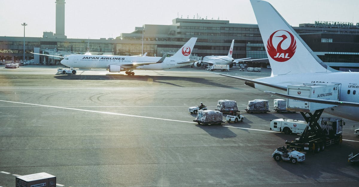 Layover/transit in Japan Narita Airport during CoViD-19 - Japan airlines filling a gas at Narita Airport