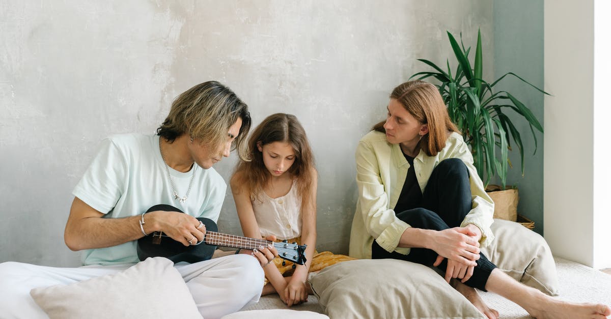 Leaving Canada - sole parent with child consent - Woman in White Long Sleeve Shirt Sitting Beside Woman in White Long Sleeve Shirt