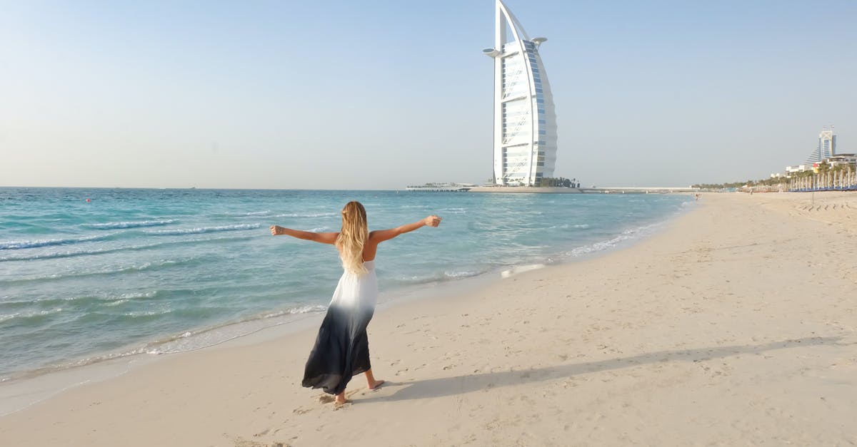 Leisure/single long-visit visa Dubai - Photography of Woman Walking On Seashore