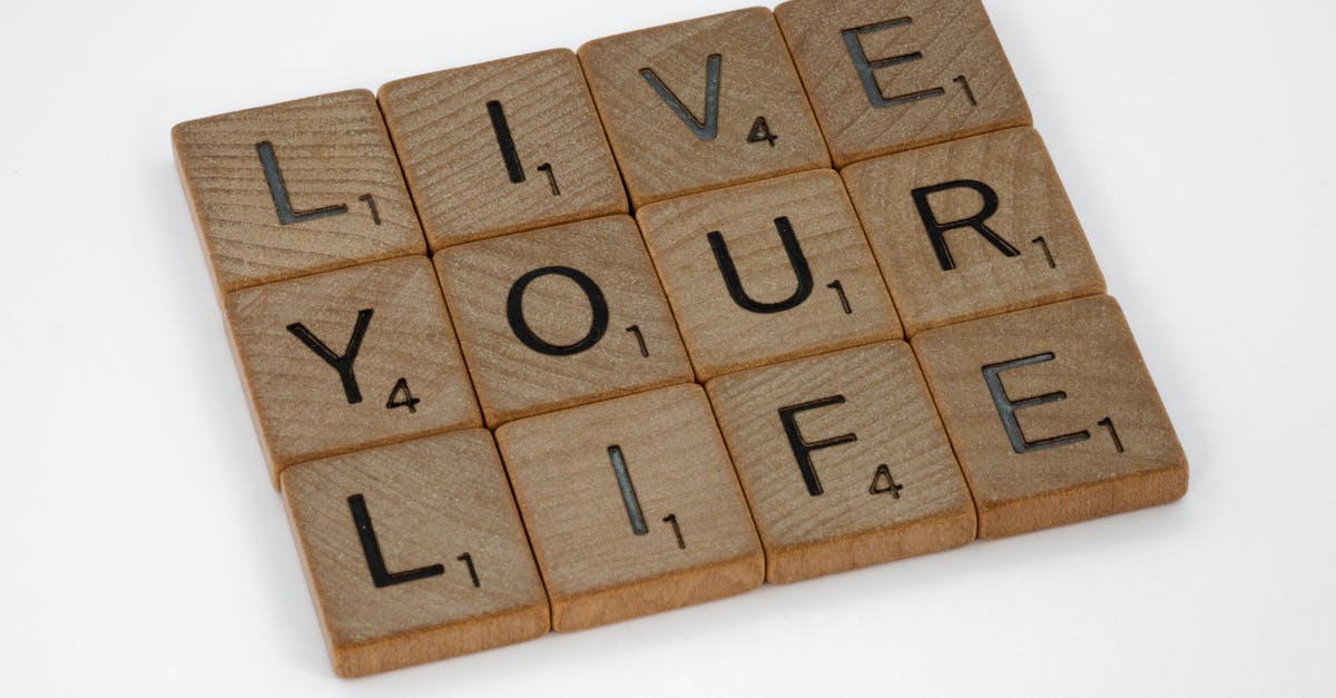 Letting someone else use your frequent flyer mile number? - Brown Wooden Blocks on White Surface