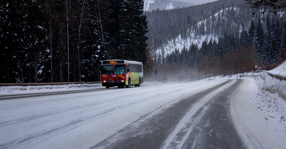 Lhasa to Kathmandu by bus -  Bus on Snow Covered Road 