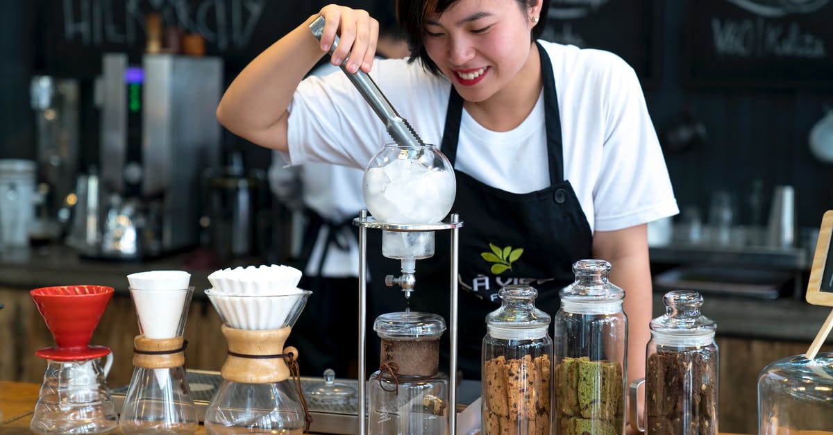 Liquid containers size at the airport [duplicate] - Woman Preparing Ice Cream in Bar