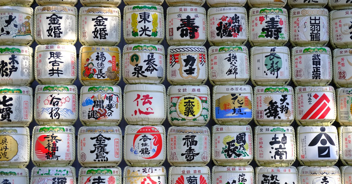 Local travel to Gare de Rennes, France, by 6.17 am - Stack of various Asian tea jars