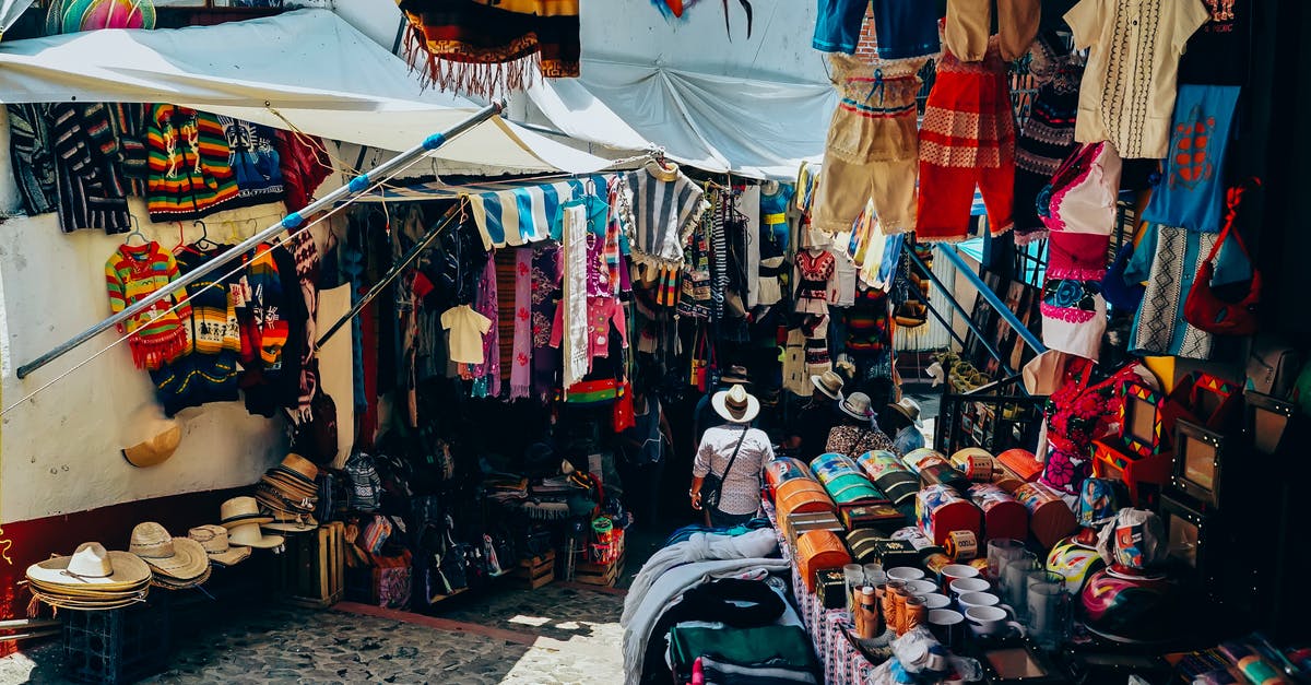 London flea market - Assorted-color Clothes Display on Street