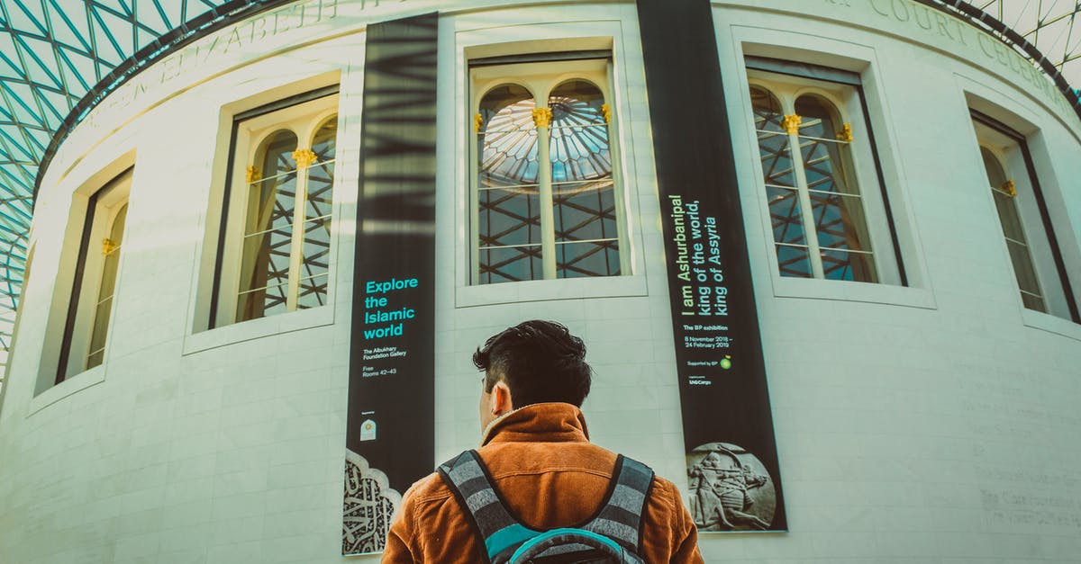 London to Stonehenge to Bath to Portsmouth back to London - A Man Wearing Brown Jacket and Backpack