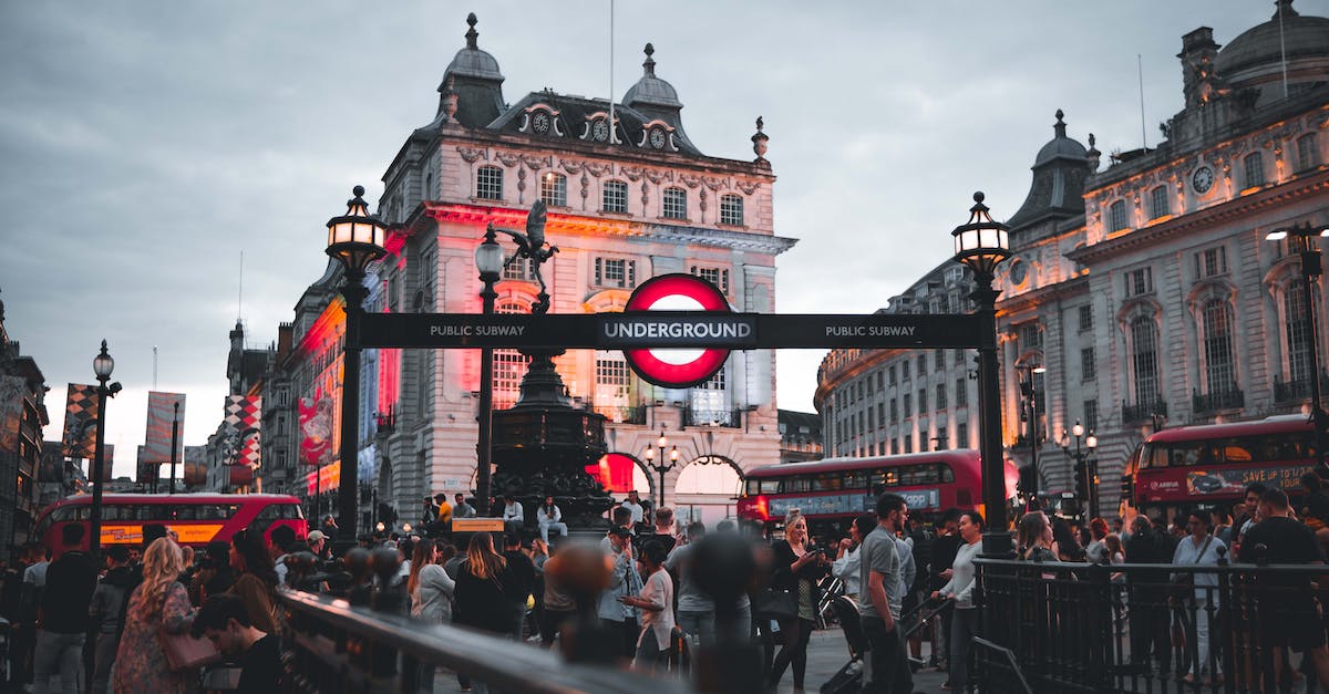 London Tour Buses - People Walking the Streets of London