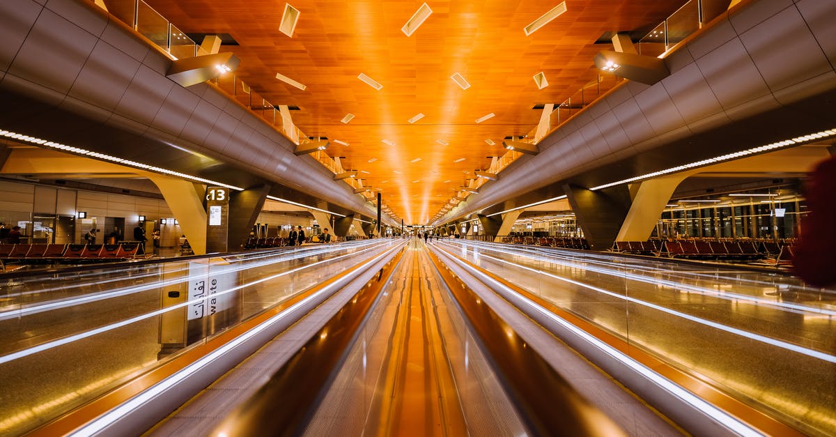 Long layover (22h) for elder relative at BKK airport - Pathway in Between Stalls