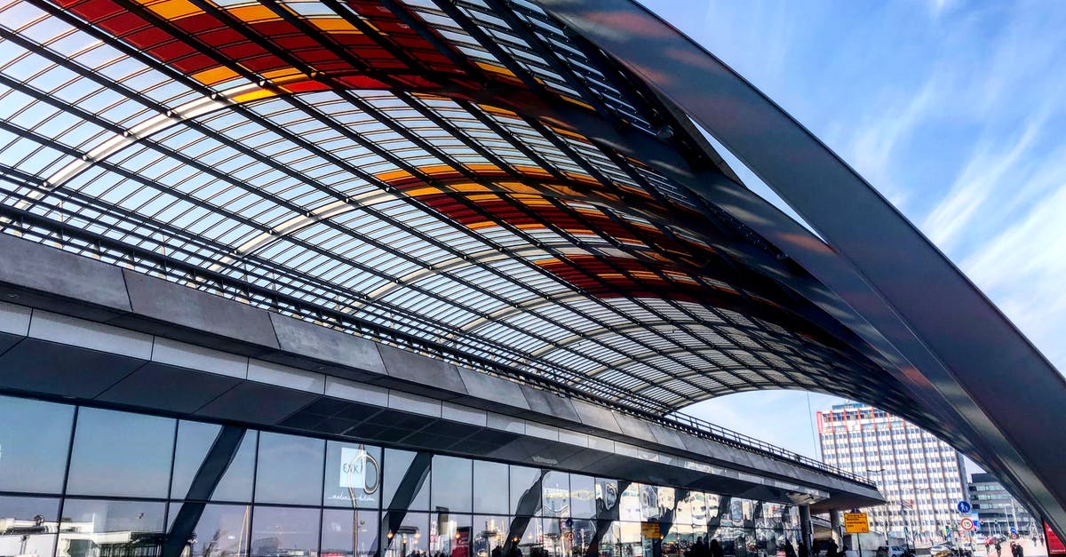 Long layover in Amsterdam airport - Amsterdam Central Station Under Color Stained Glass Roof