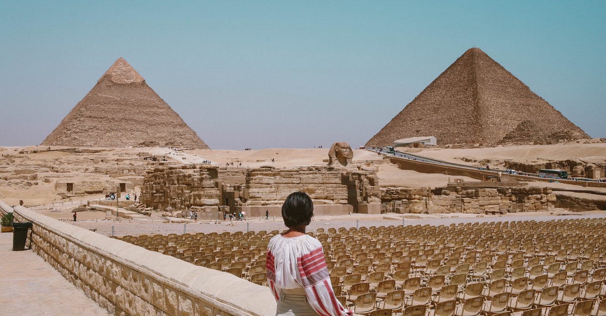 Long transit in Cairo (Egypt) - Woman Looking At Pyramids