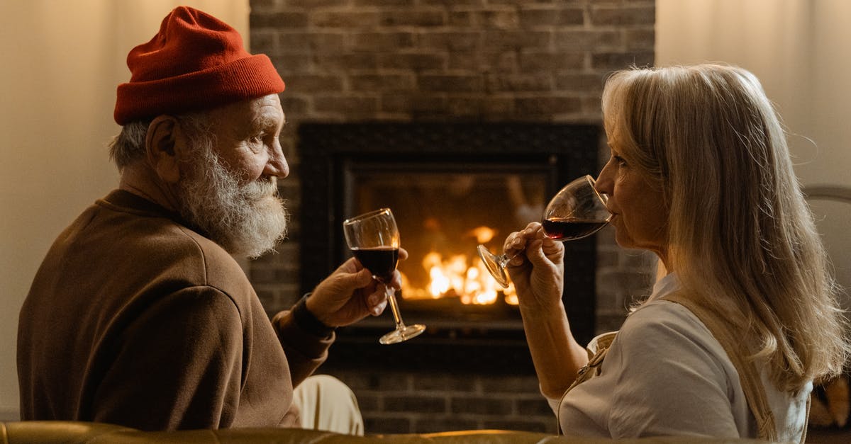 Longer EU stay for retired couple - Man and Woman Holding Wine Glasses