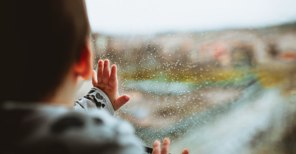 Long-term travel with a 3-month-old baby through a country? [closed] - Selective Focus Photography of a Baby Looking Through The Window