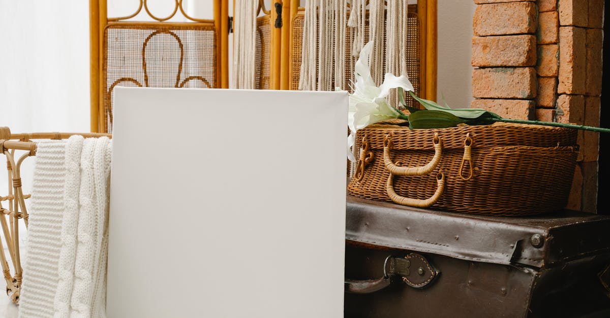 Lost Luggage with Norwegian Air, filled PIR but no bag tags - Canvas placed against retro suitcases and folding screen Lost Luggage with Norwegian Air, filled PIR but no bag tags - Canvas placed against retro suitcases and folding screen