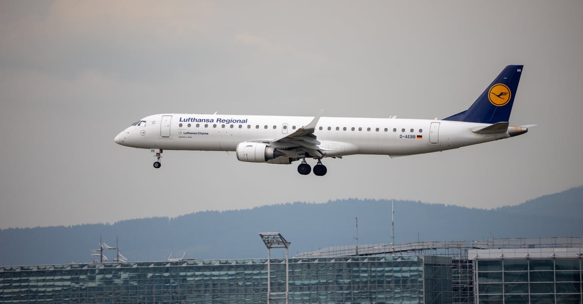 Lufthansa - Rail & Fly at Frankfurt Airport - An Airplane Flying in the Sky