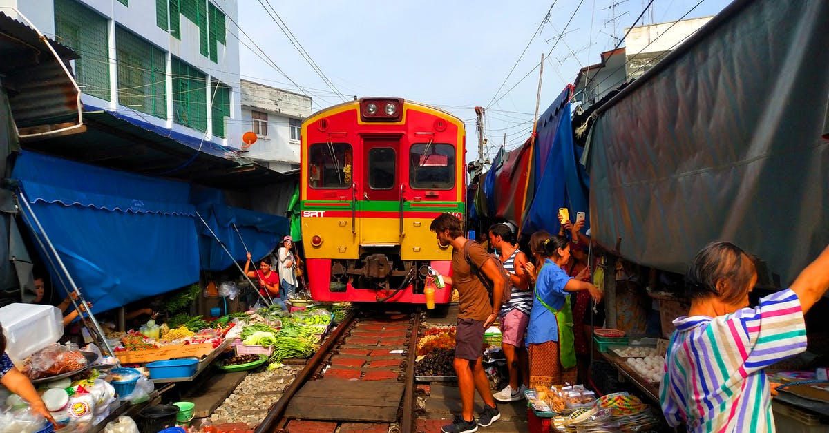 Maeklong Railway Timetable - A Market Near a Railway