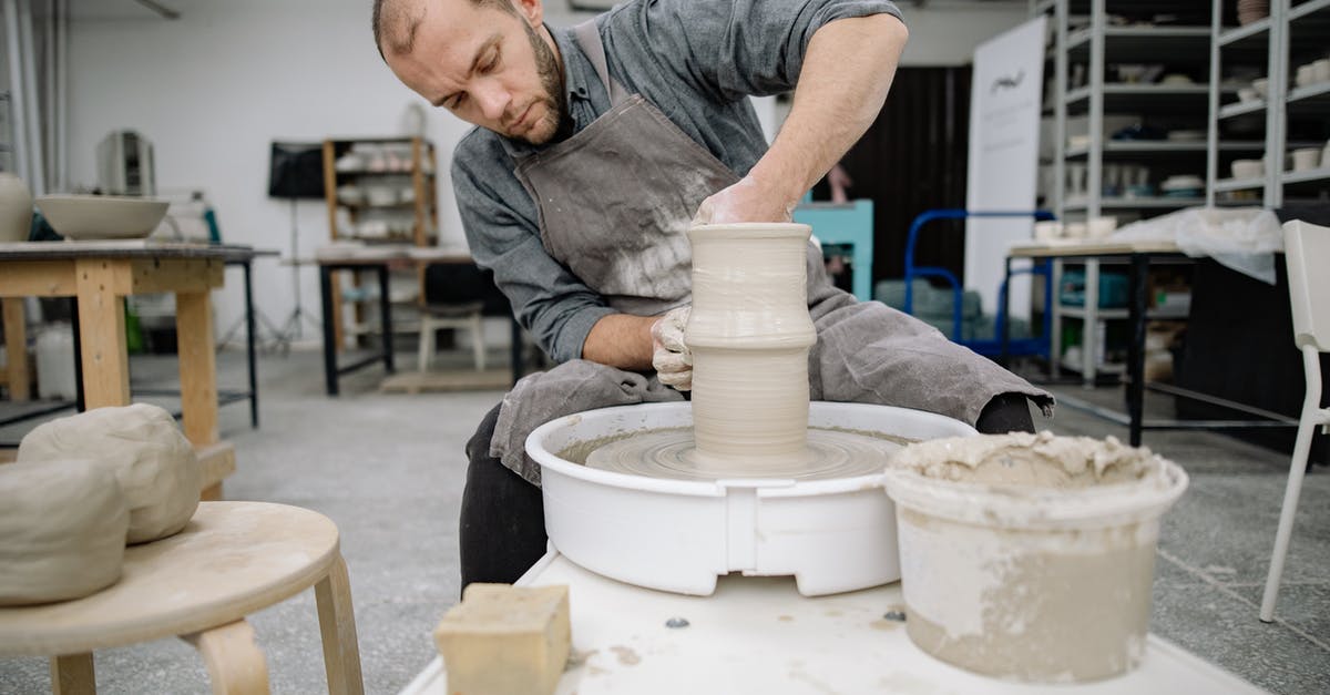 Making sense of colectivos in Viña del Mar - Hands of a Potter Making a Vase with a Pottery Wheel