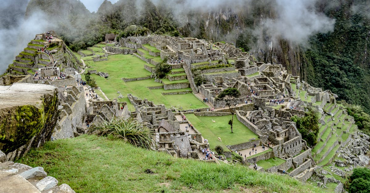 Making stops on the way from Machu Picchu to Cusco - Green Grass Field Near Mountain