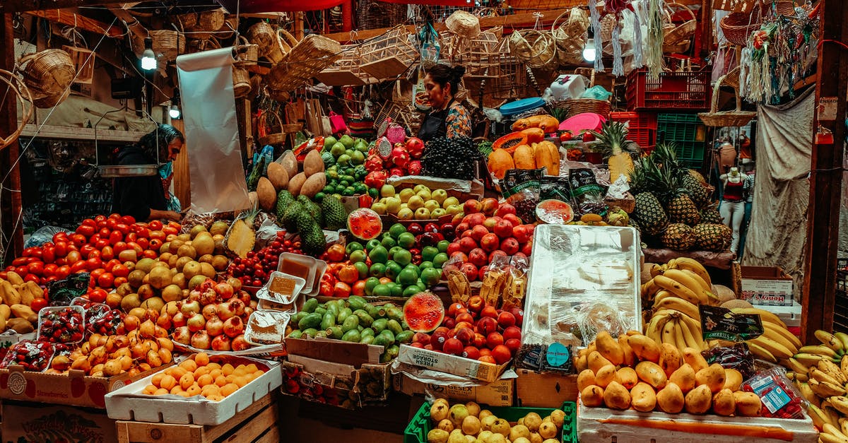 Mangoes and Bananas from Manila to Switzerland - A Woman Selling Fruits