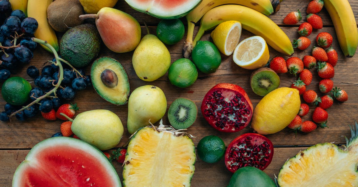 Mangoes and Bananas from Manila to Switzerland - Assorted Fruits on Wooden Surface