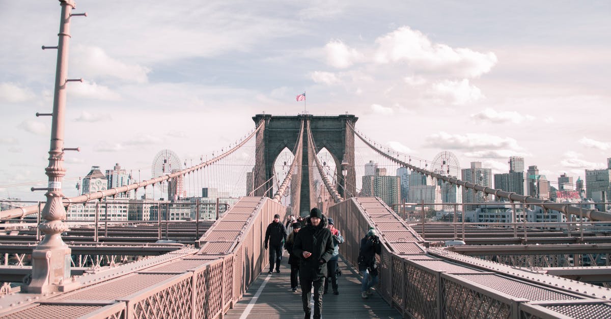 Manhattan Ferry/Water taxi to Brooklyn Bridge park - Man Running on the Bridge