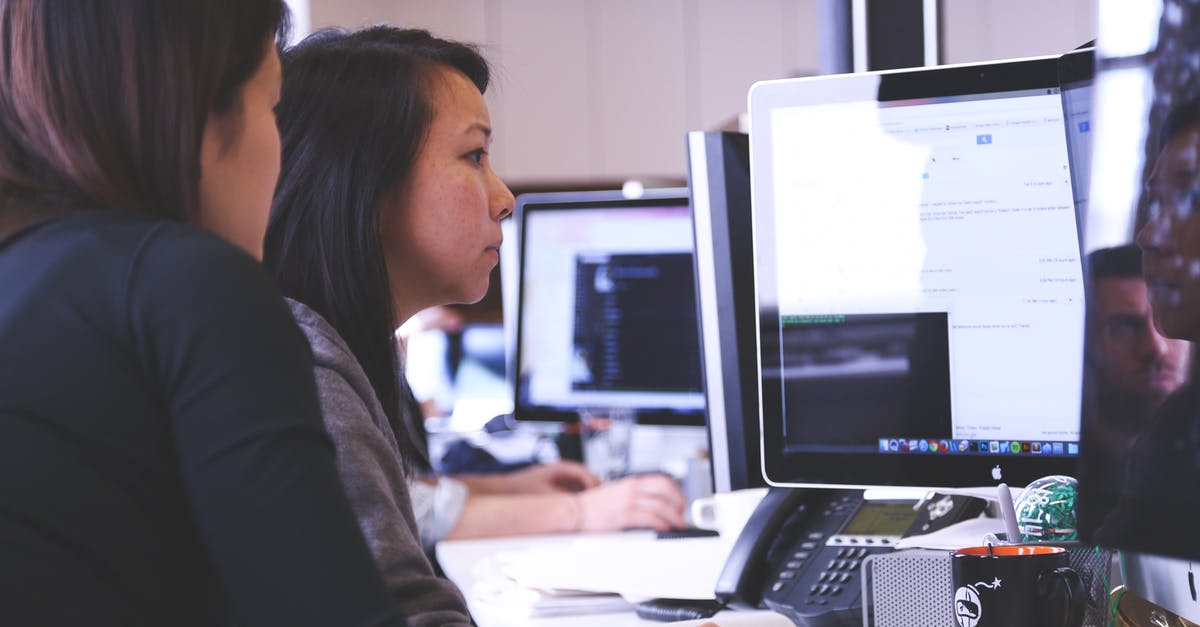 Marketing Leg and Code Share Flight - Two Women Sitting in Front of Computer Monitor