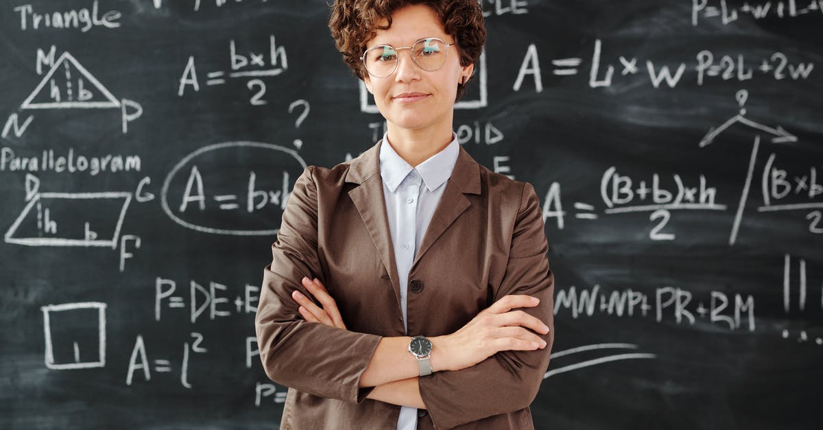 Maximum Number of Occupants crossing US/Canada Border - Photo Of Woman Standing In Front Of Blackboard