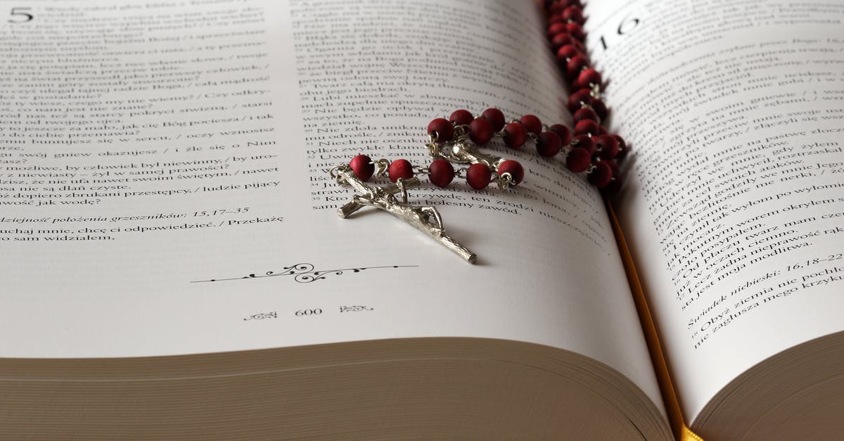 May I cross closed gates in Iceland? - Rosary on Top of Opened Bible Book