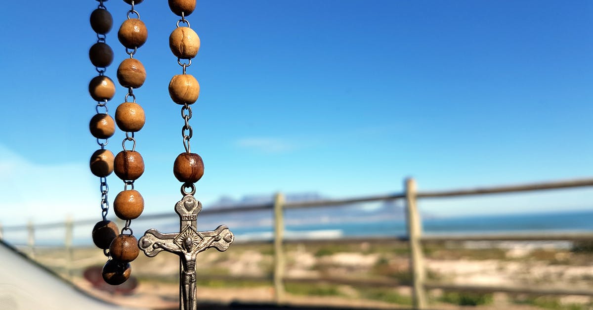 May I cross closed gates in Iceland? - Selective Focus Photo of Brown and Silver Rosary