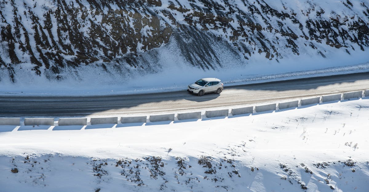 May I drive an Indian-registered car in Nepal? - White Car on Mountain Road 