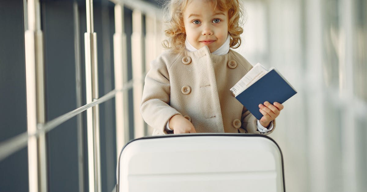 May relatives without boarding passes accompany ticketed passengers to the departure gate? - Cute little girl with suitcase and passport May relatives without boarding passes accompany ticketed passengers to the departure gate? - Cute little girl with suitcase and passport