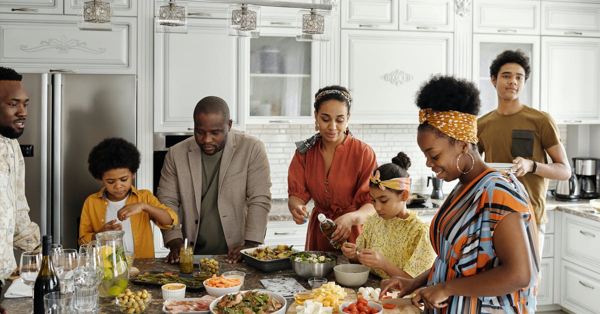 Meal times in Ireland - Family Preparing Food in the Kitchen