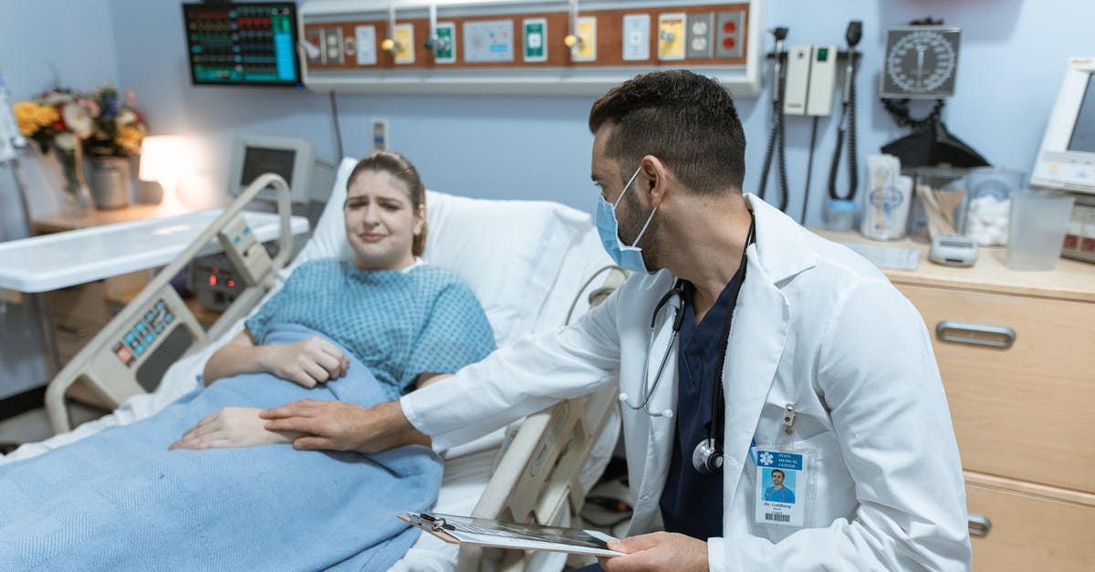 Medical attendant visa for Sweden - Doctor Comforting a Crying Patient