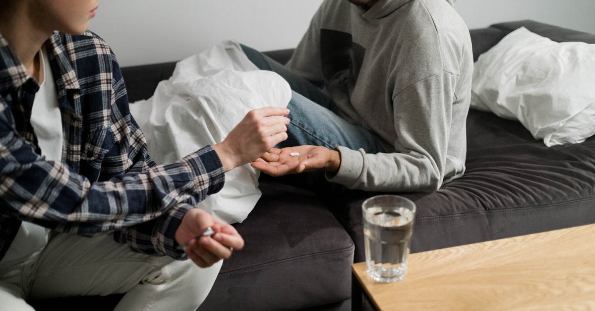 Medication for ADHD - Man in Gray Hoodie Sitting on Couch