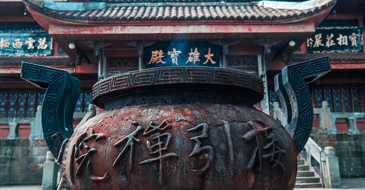 Metal flask while travelling from Heathrow Terminal 3 to Asia - Photography of The Temple