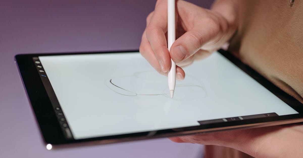 Micro SIM 3G for iPad in Vienna? - Person Holding White Pen on White Laptop Computer