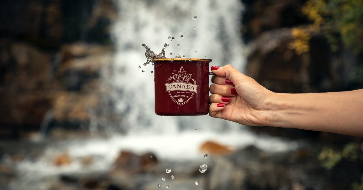 Minor drinking in Canada - Person Holding Red Mug