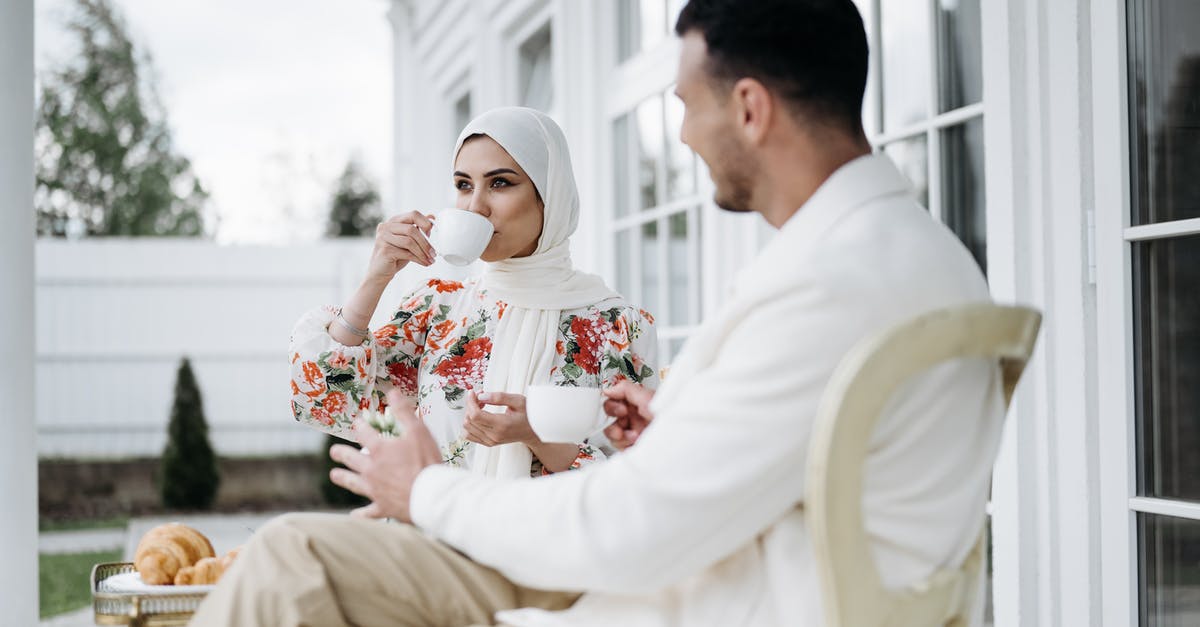 Minor drinking in Canada - Man in White Dress Shirt Holding Bouquet of Flowers