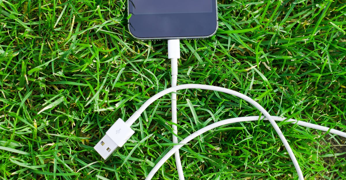 Missed ground connection - Black Ipod Touch and Cable on Grass