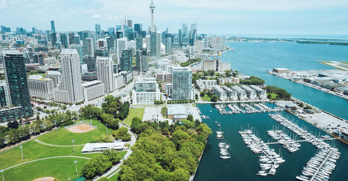 Mobile Data for Short Trip to Toronto, Canada - Architecture and harbor with moored boats of contemporary coastal city