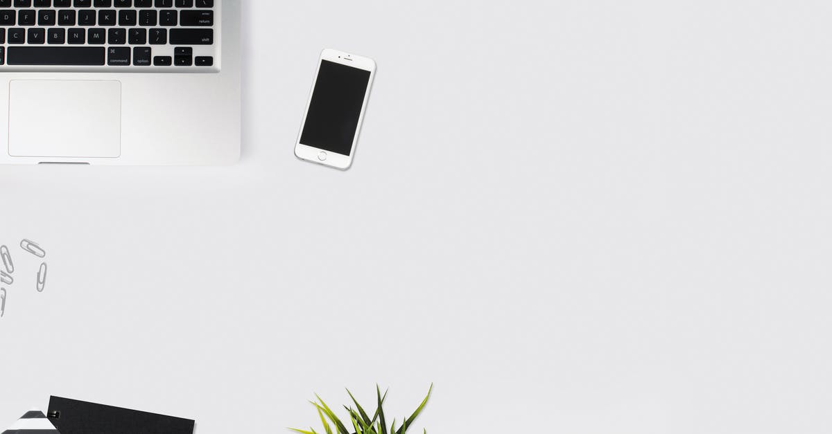 Mobile internet in the Caucasus - White Smartphone Beside Silver Laptop Computer