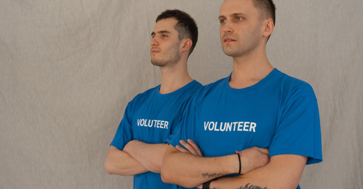 Moldova e-visa application help - Photo of Volunteers Crossing Their Arms