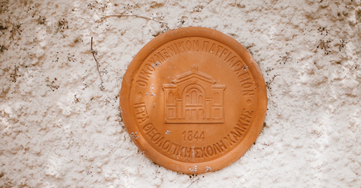 Money seized at the border - Brown Round Plastic Lid on White Surface