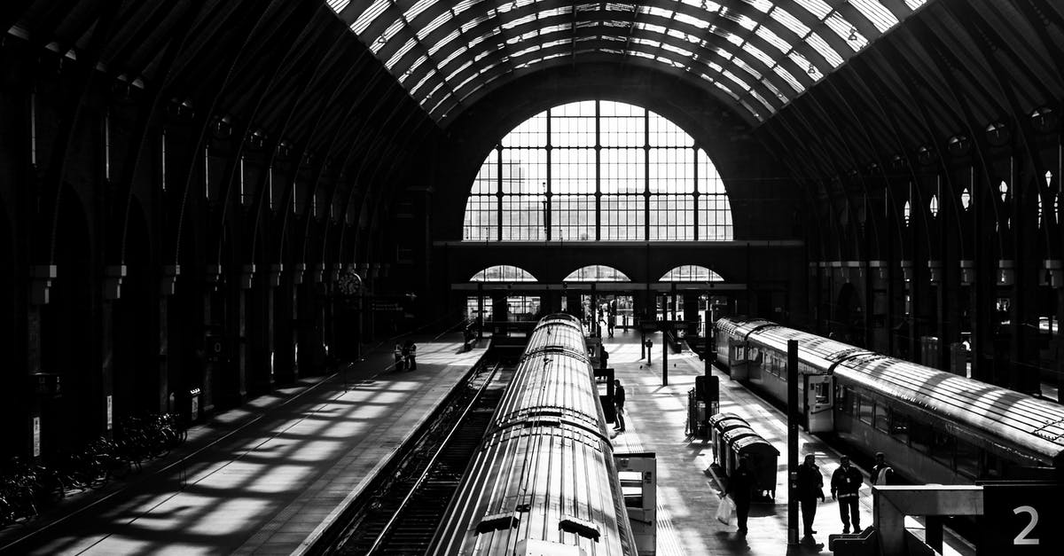 Money withdrawal options around Prague's Main Train Station? - Grayscale Photo of Train Station