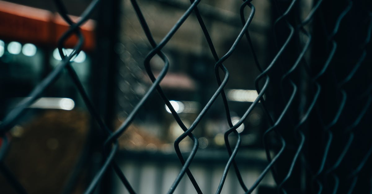 Montreal - Ottawa night connection at Sunday - Close-up Photography of Gray Metal Chainlink Fence