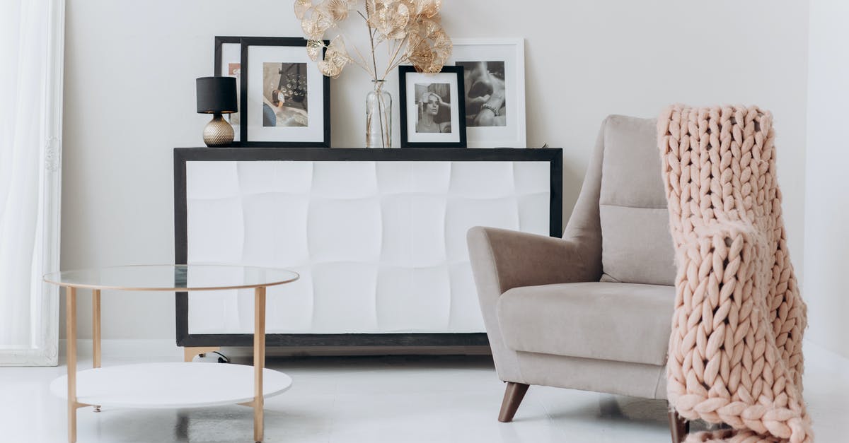 Most respectful way to set alarm when sharing the room - Beige Sofa Chair Near A Table