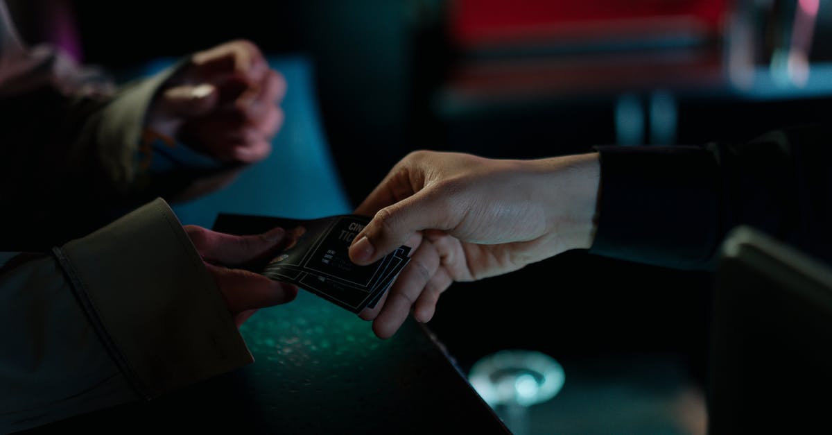 MULTI TICKETS refunds - Person Handing a Cinema Tickets